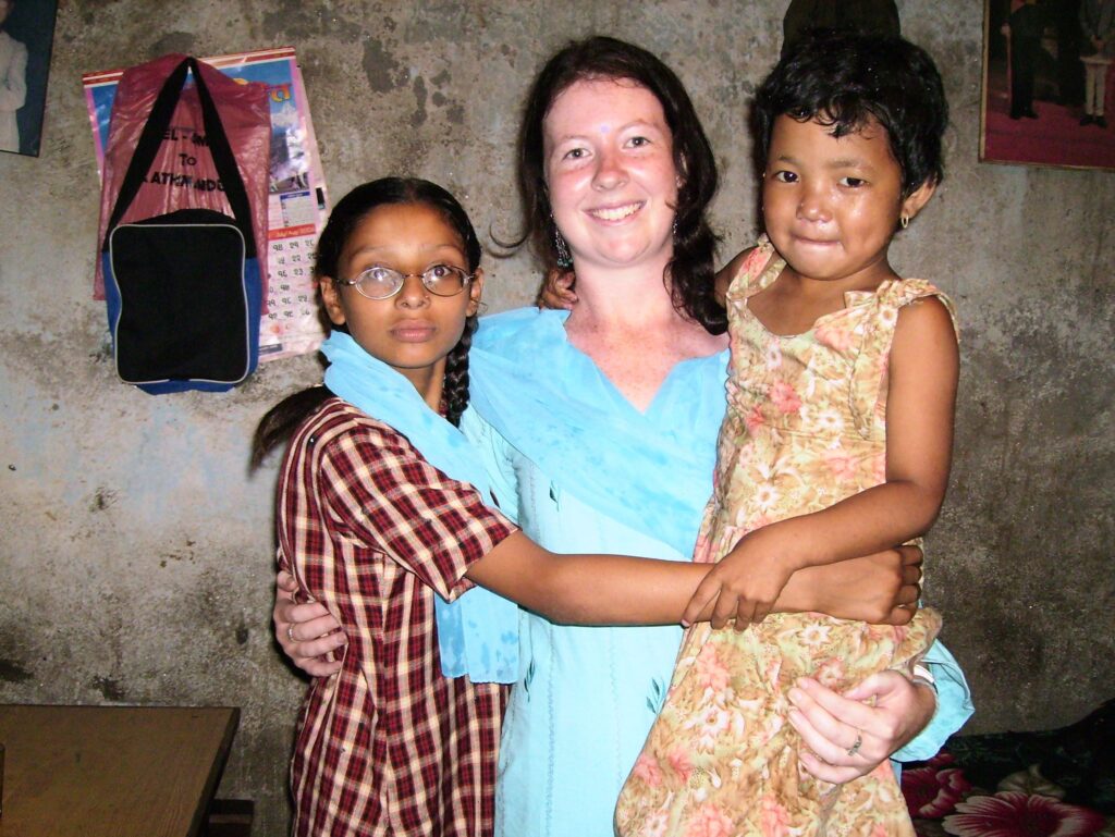 With the next-door neighbour Sunita and her little sister. In my new kurta - bright sky blue with little flower images embedded. One of my first impressions of Nepal was meeting the neighbours.